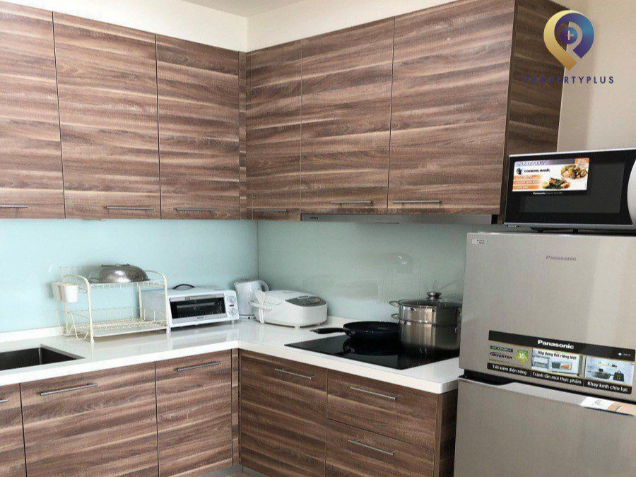 Fully equipped kitchen area in The Authentic Haseko serviced apartment